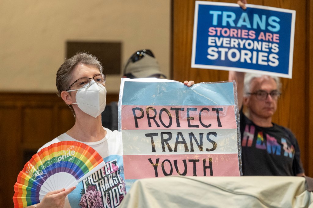 Pro-transgender kids Protesters rally at a Lutheran Church of Reformation in Washington, DC, on June 18, 2025.