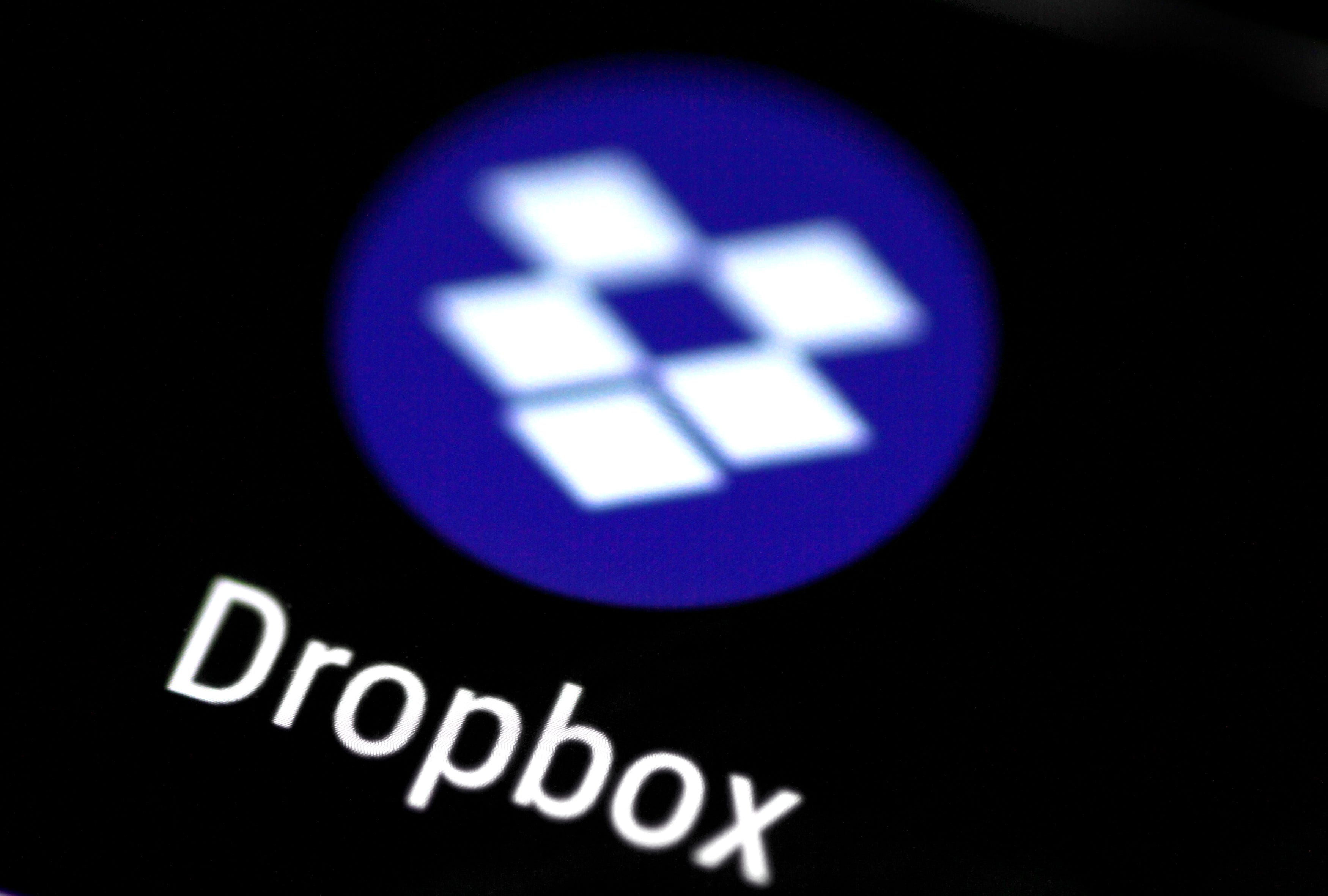 FILE PHOTO: The Dropbox app logo seen on a mobile phone in this illustration photo October 16, 2017. REUTERS/Thomas White/Illustration