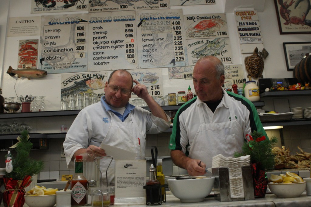 Owners Jimmy Sancimino and Steve Sancimino prepare for the lunch rush on Dec. 1, 2011.