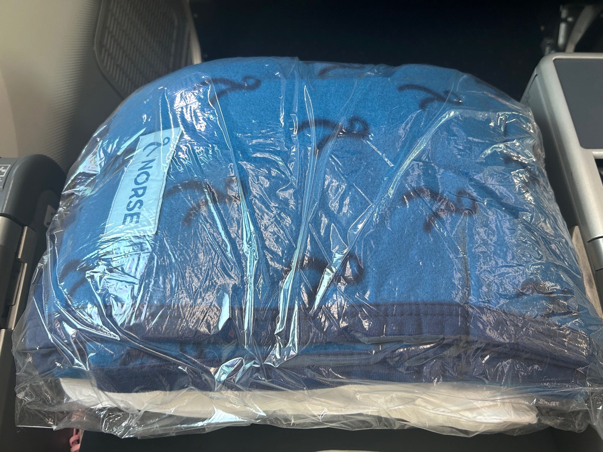 Provided blanket and pillow on Norse Atlantic Airways premium economy