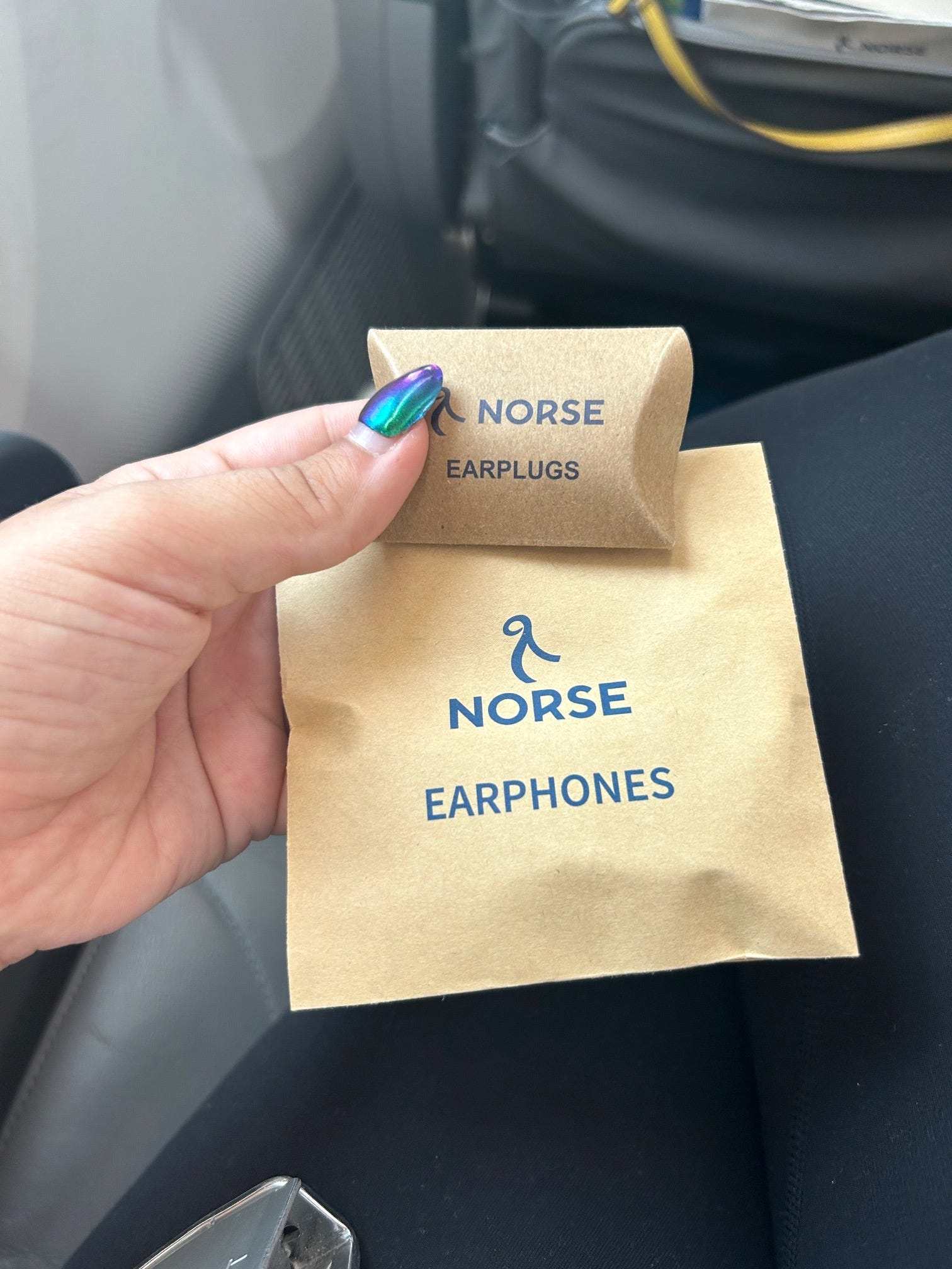 Provided headphones and earplugs on Norse Atlantic Airways premium economy
