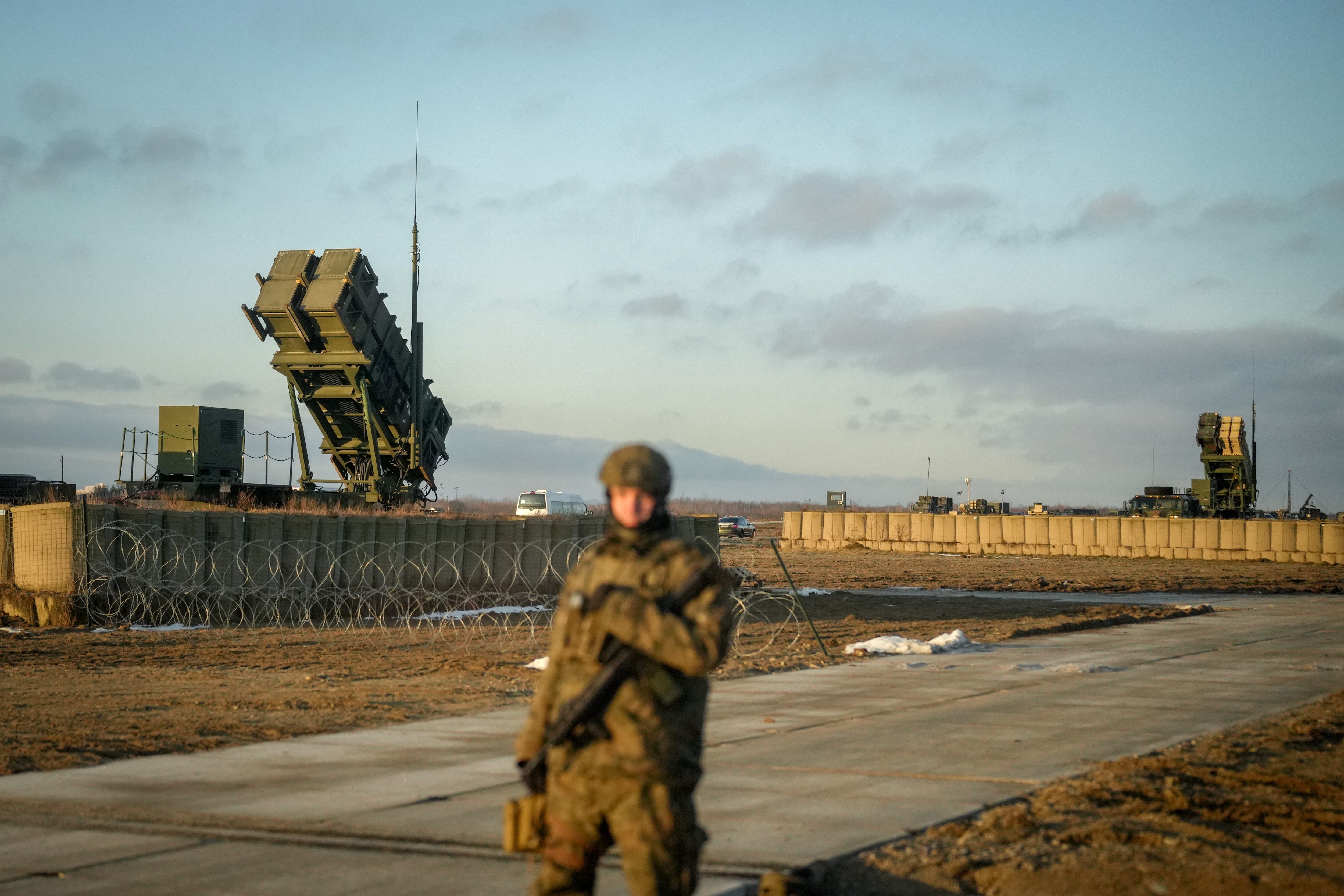 German soldiers guard a Patriot air-defense system in Poland on January 23.