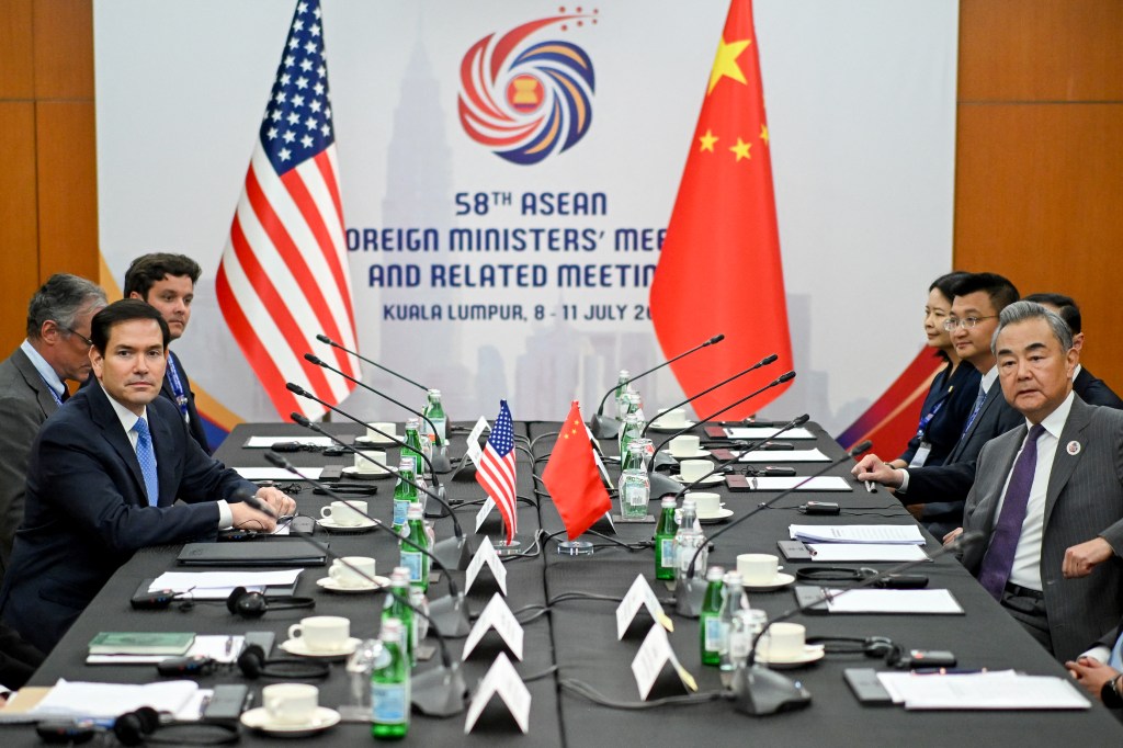 US and Chinese diplomats meeting at the 58th ASEAN Foreign Ministers' Meeting.