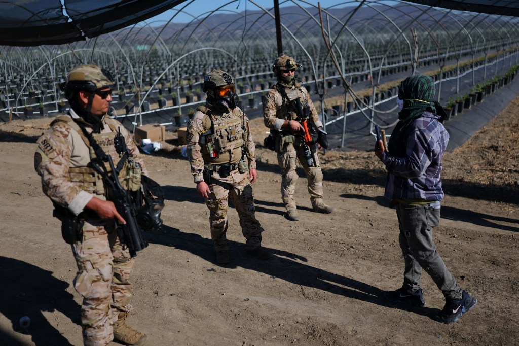 Federal agents raid an agricultural facility.