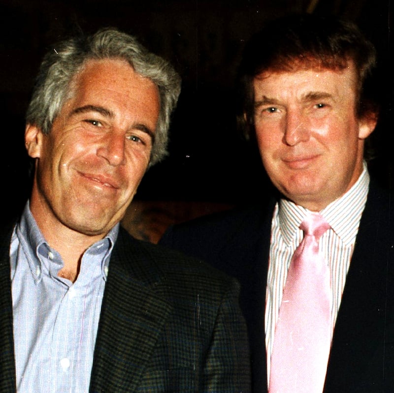 Portrait of American financier Jeffrey Epstein (left) and real estate developer Donald Trump as they pose together at the Mar-a-Lago estate, Palm Beach, Florida, 1997. (Photo by Davidoff Studios/Getty Images)