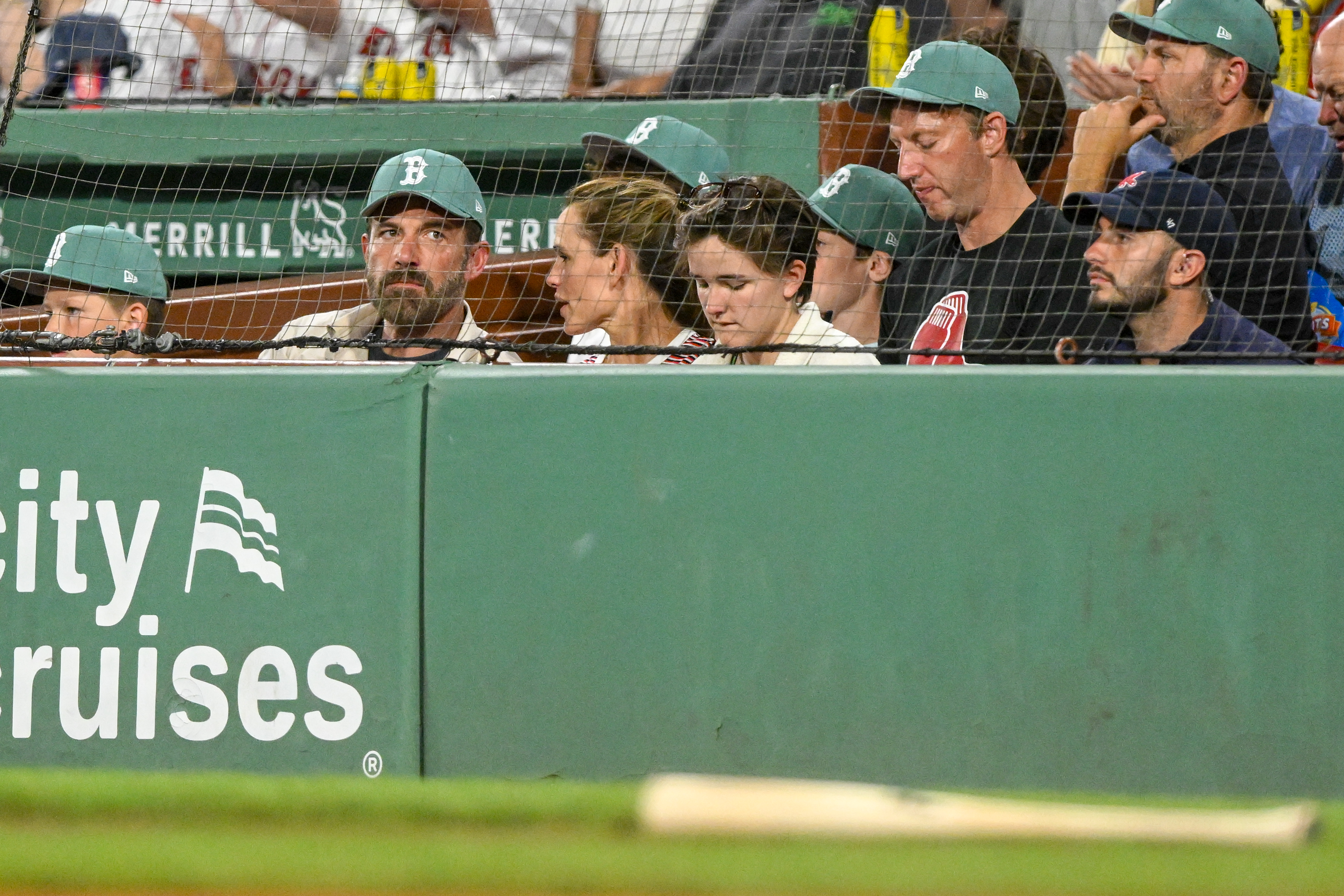 Jennifer Garner and Ben Affleck at a baseball game. 