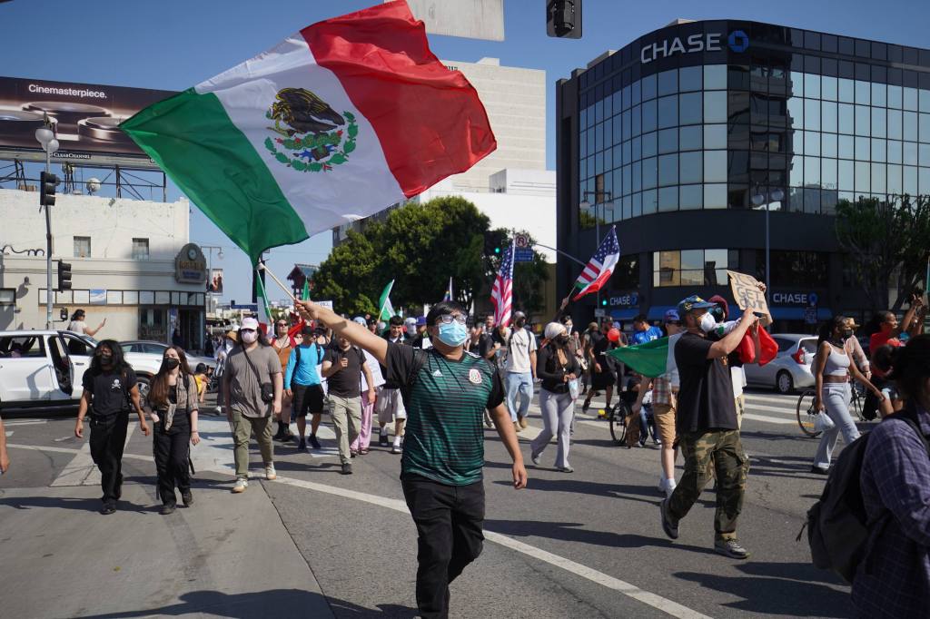 Protestors marching in Los Angeles against ICE raids.