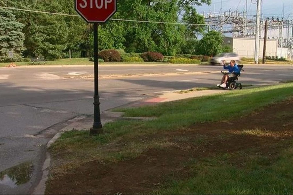 Man in wheelchair hit by car at intersection.