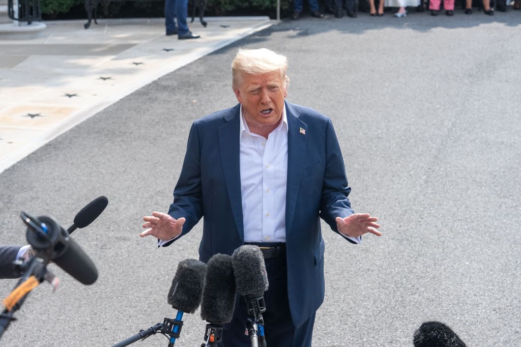 Donald Trump speaking to reporters outside the White House.