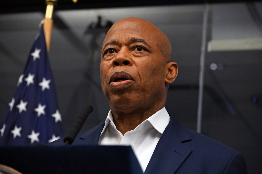 Mayor Eric Adams speaking at a press briefing.
