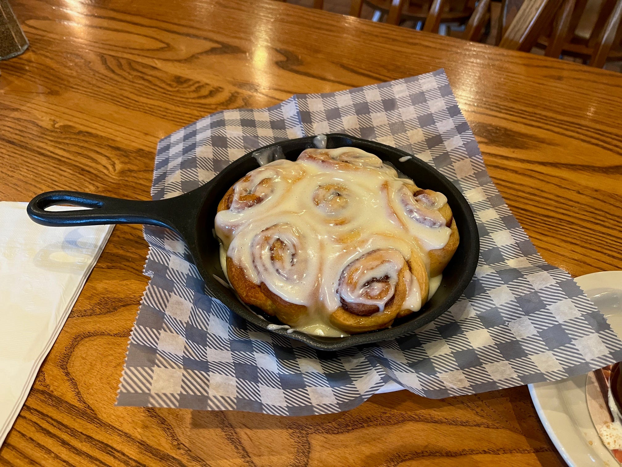 Cracker Barrel's Cinnamon Roll Skillet sits on a table at the restaurant