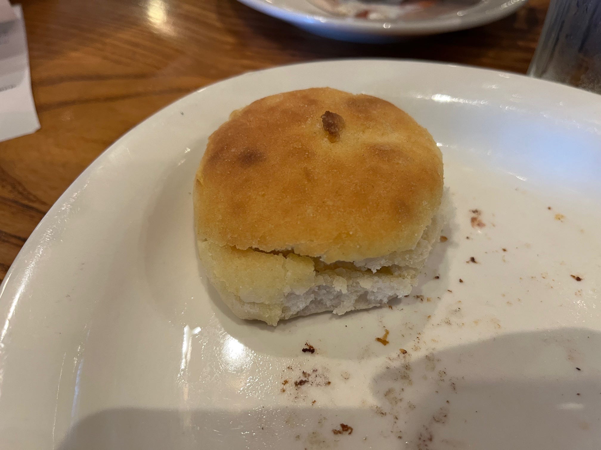 A biscuit on the table at Cracker Barrel