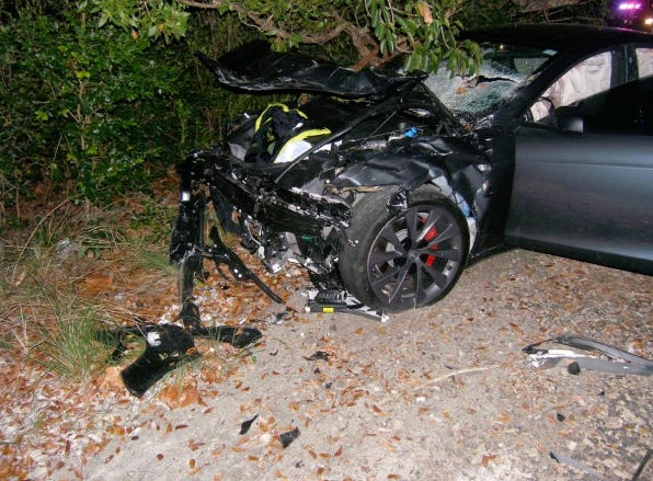 A wrecked Tesla.