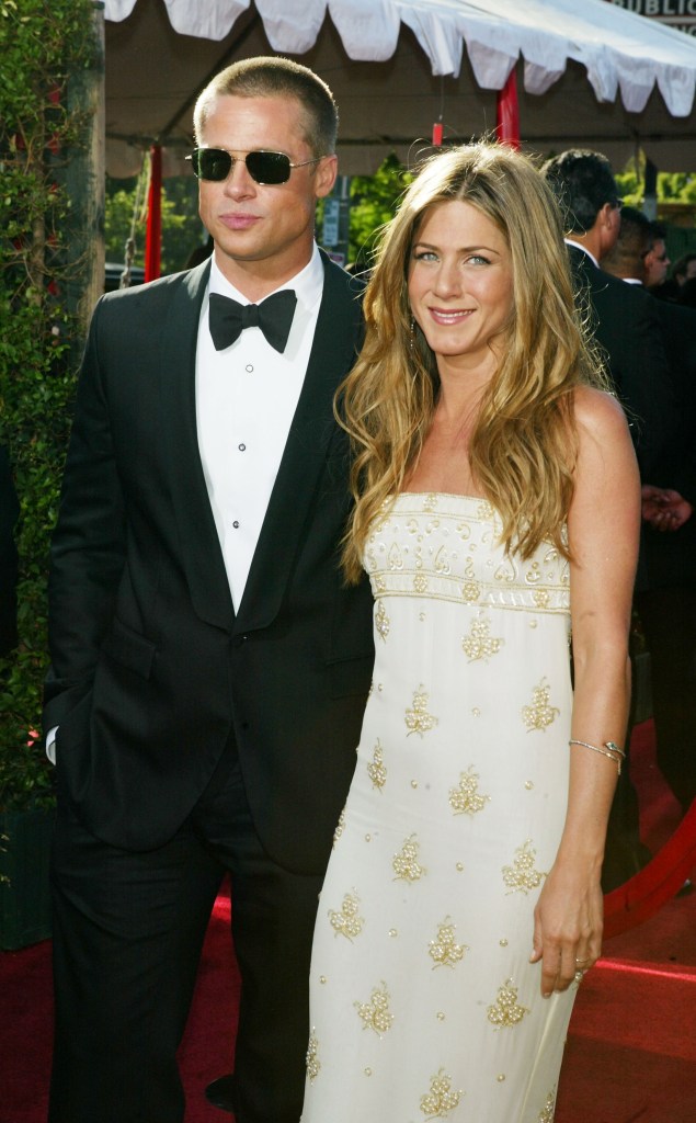 Brad Pitt in a tuxedo and sunglasses, Jennifer Aniston in a white beaded gown at the 2004 Emmys.