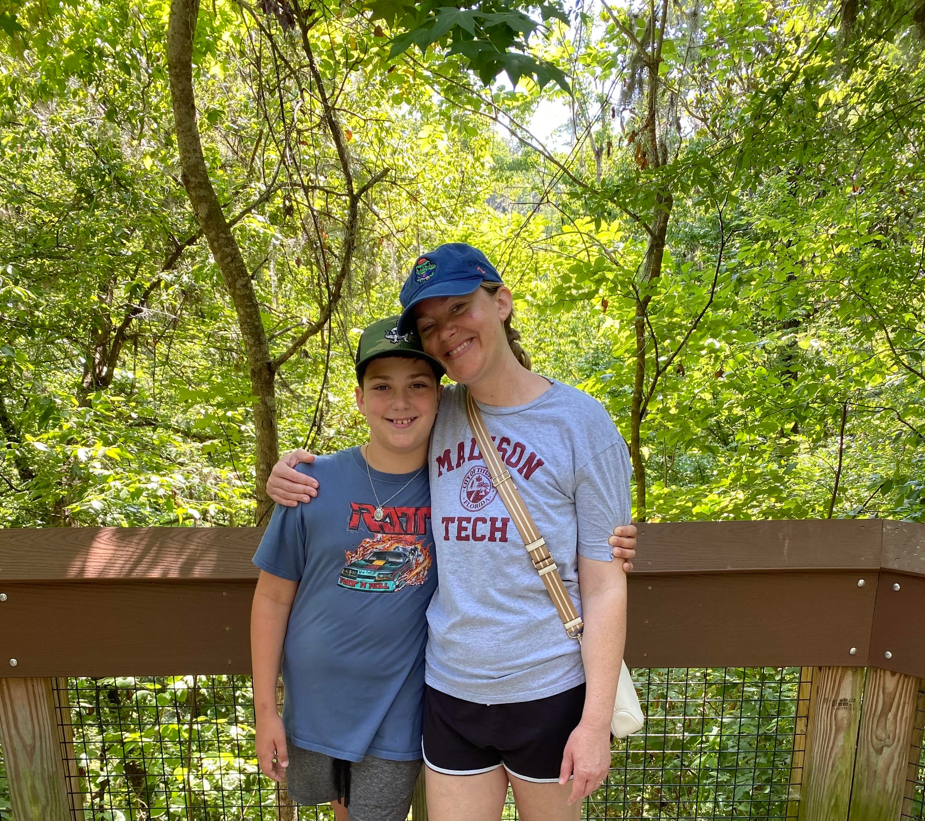 Mom and son posing for photo