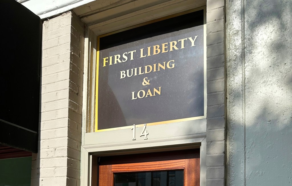 Sign for First Liberty Building & Loan.