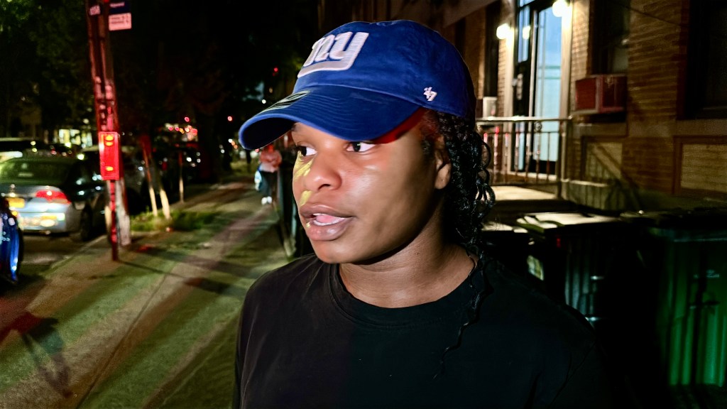 Jada McPherson attends a rally in Ridgewood. 