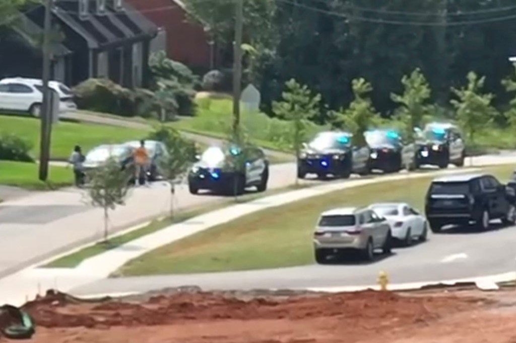 Police are shown at the scene of Saturday's shooting in Chattanooga.