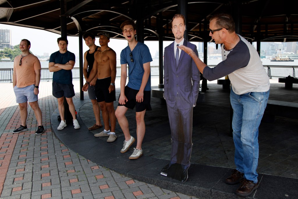 Men participate in a Leonardo DiCaprio lookalike contest.