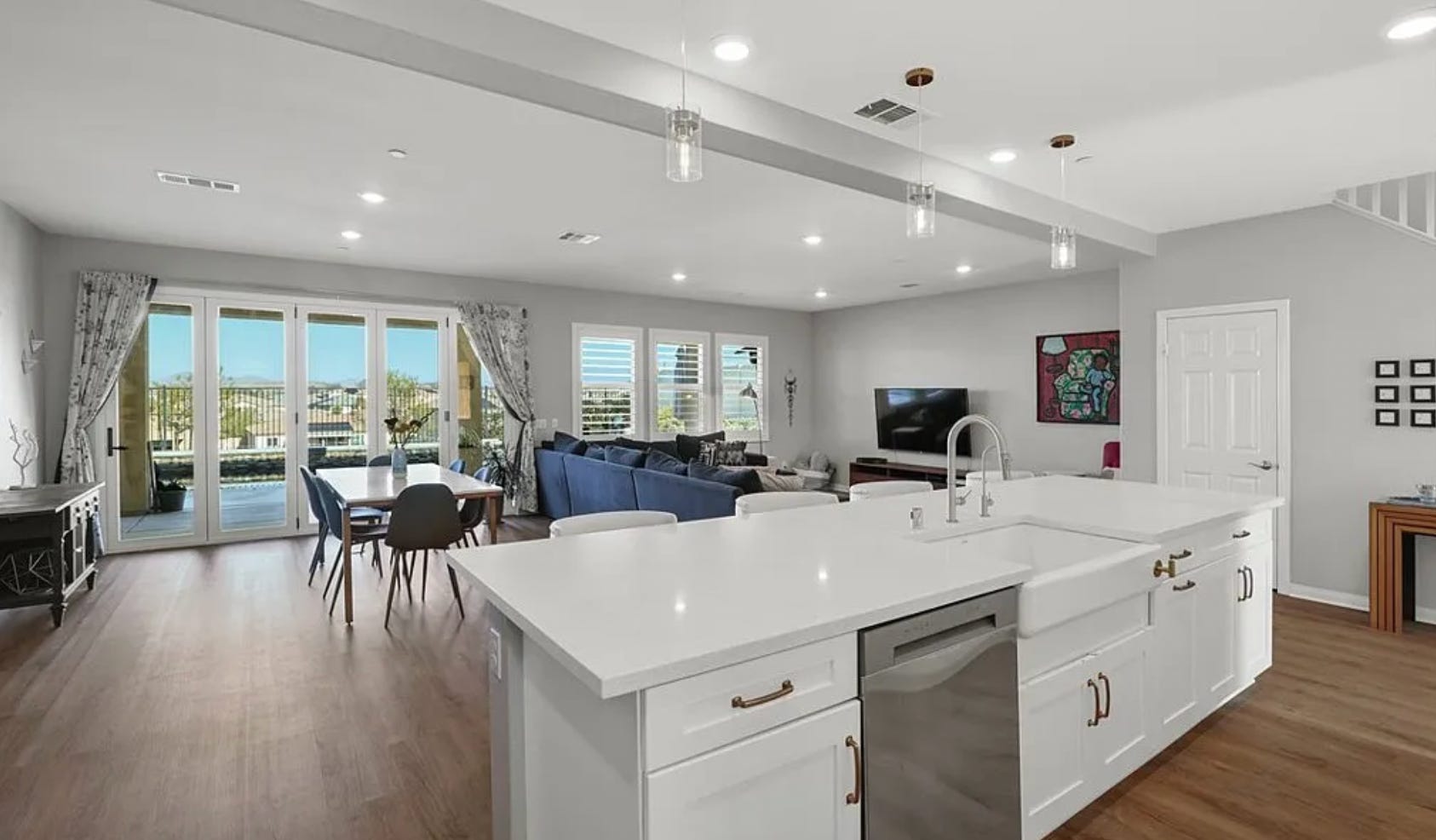 pic of white kitchen and living room