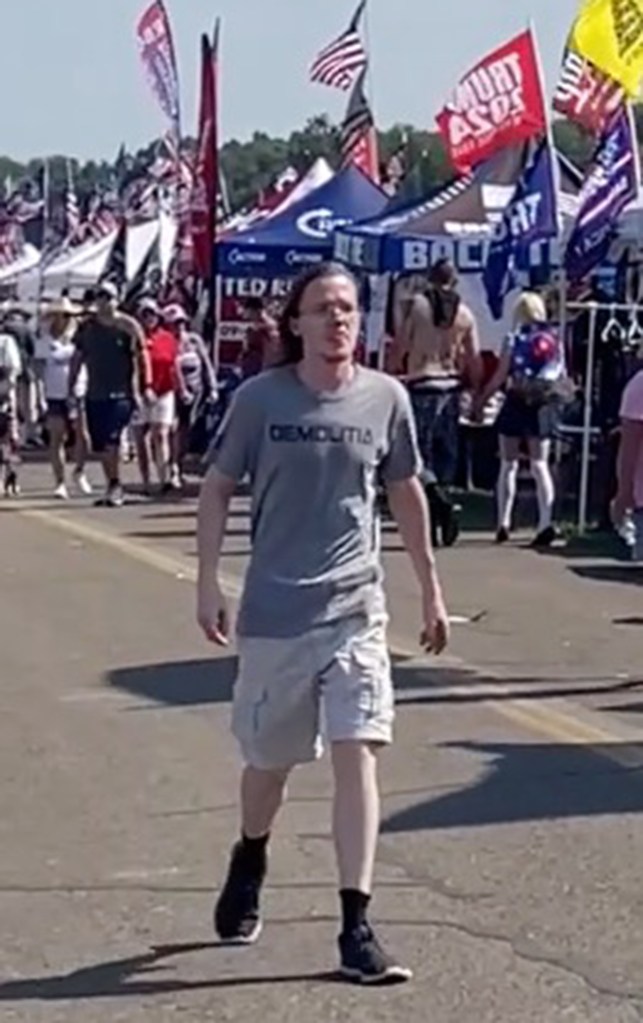 Thomas Matthew Crooks walking through a crowd at a Trump rally.