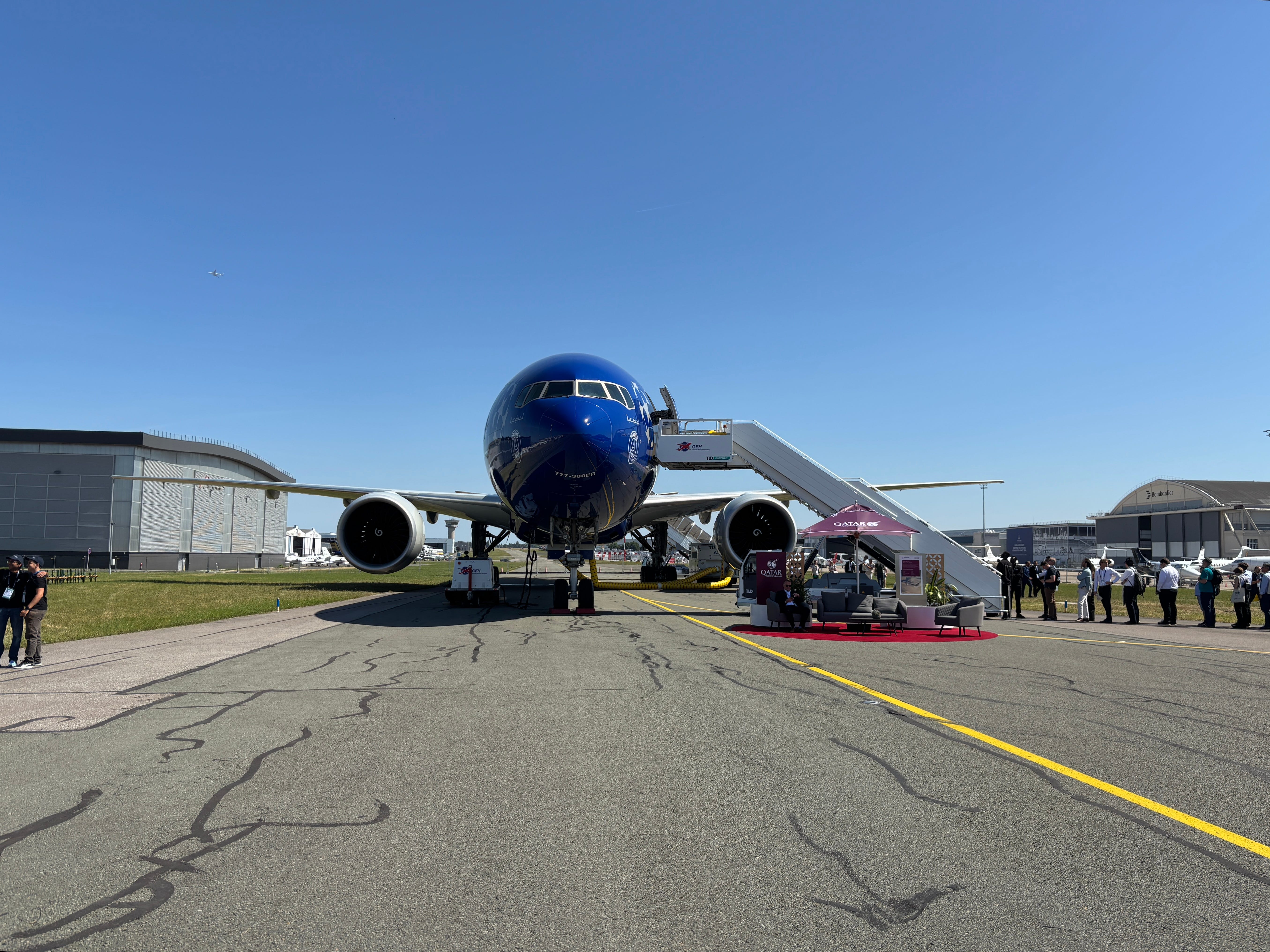 A front view of a Qatar Airways Boeing 777 in the PSG Champions League livery at the 2025 Paris Air Show