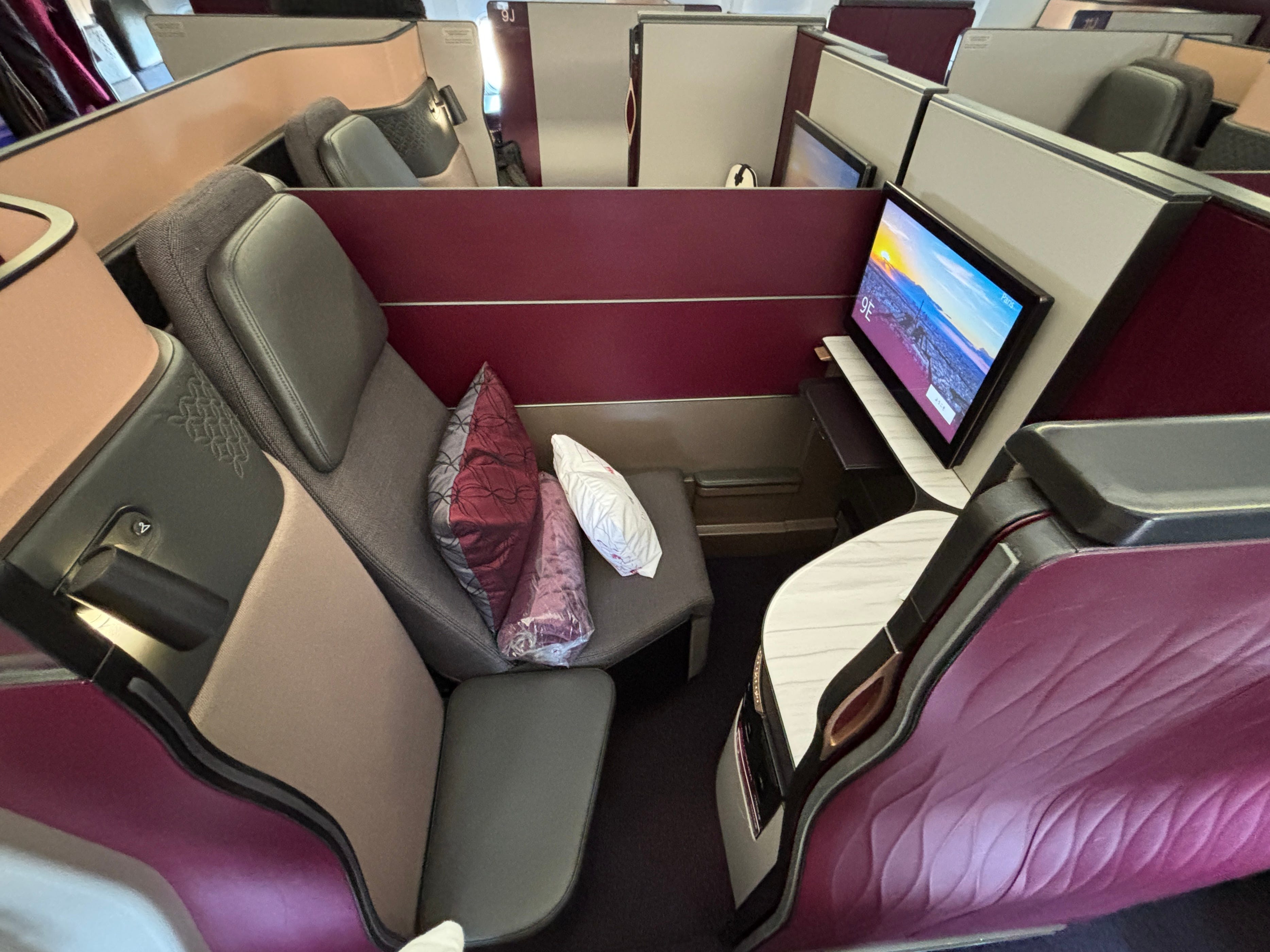 A top view of a QSuite on a Qatar Airways Boeing 777