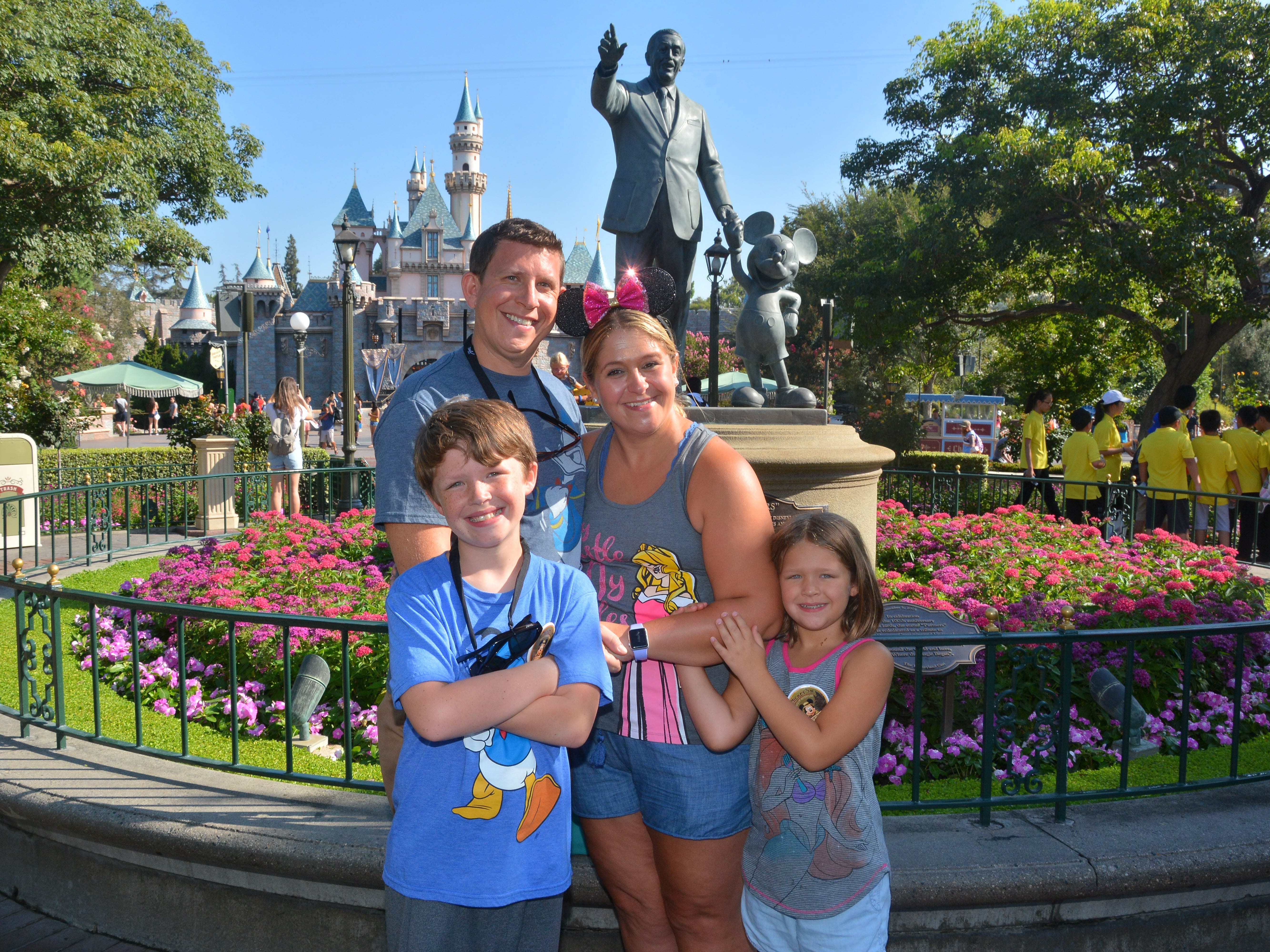 The author with her family at a Disney theme park.