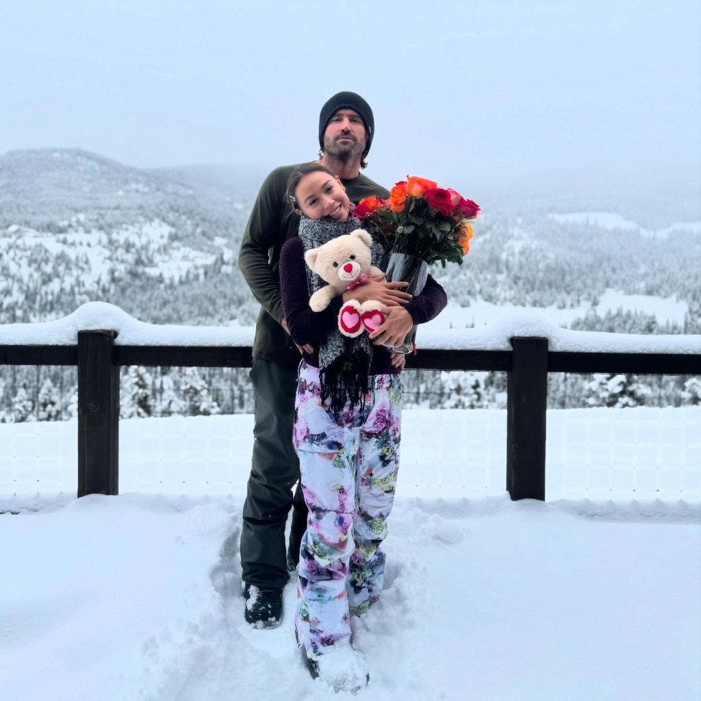 Brody Jenner posing with Tia Blanco in the snow.
