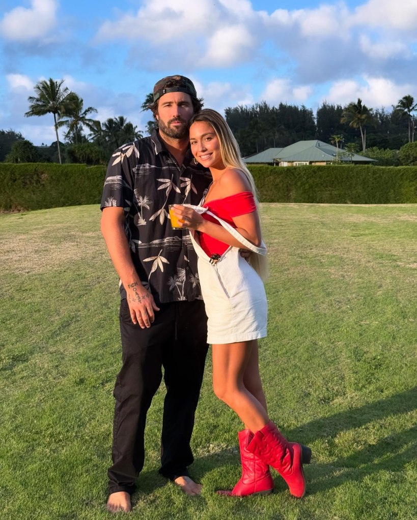 Brody Jenner posing with Tia Blanco.