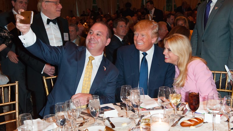 March 20, 2016: Blaise Ingoglia, Donald Trump, Pam Bondi taking a selfie. Keynote Speaker Donald Trump with guest Dr. Ben Carson attend the Palm Beach Lincoln Day Dinner at Mar-a-Lago, Palm Beach, Florida (Photo by Michele Eve Sandberg/Corbis via Getty Images)