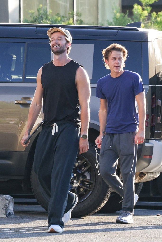 Patrick Schwarzenegger flaunted his toned arms while with John Owen Lowe in Los Angeles on Saturday.