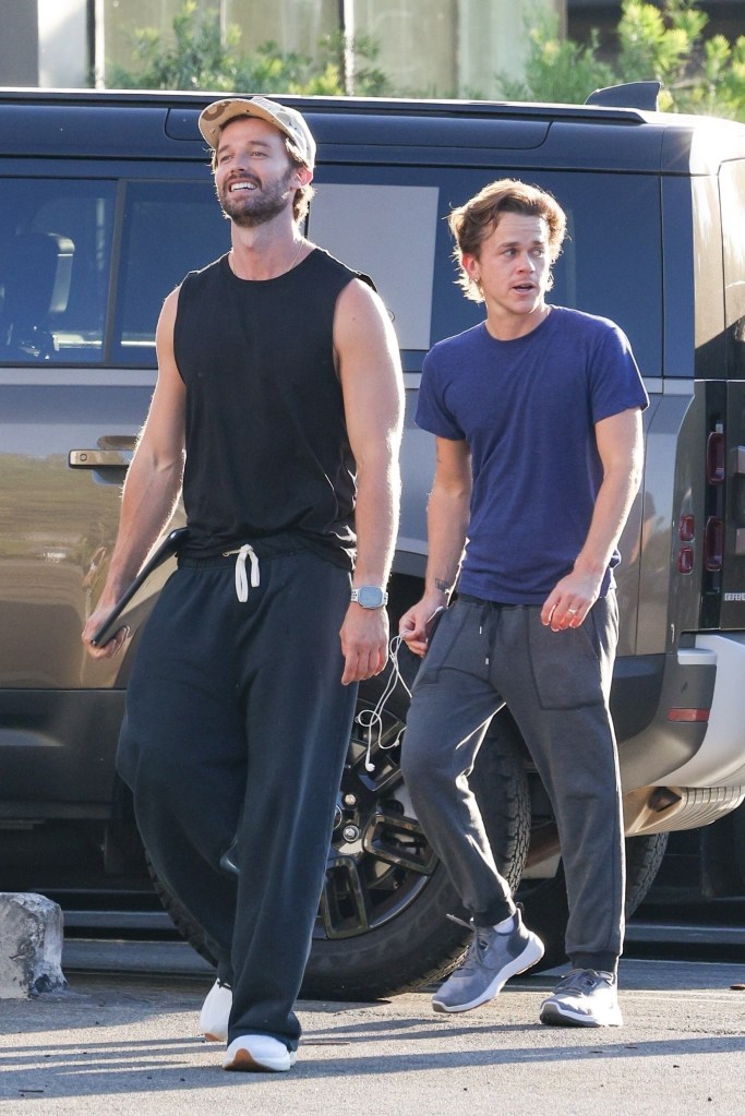 Patrick Schwarzenegger flaunted his toned arms while with John Owen Lowe in Los Angeles on Saturday.