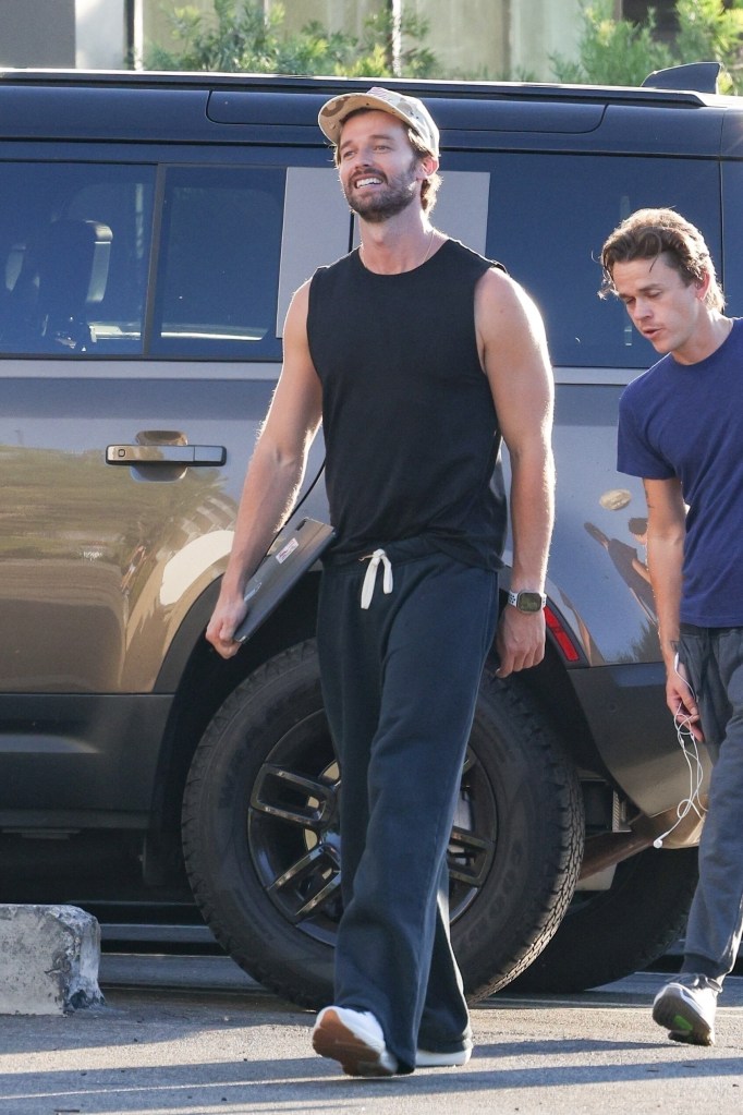 Patrick Schwarzenegger flaunted his toned arms while with John Owen Lowe in Los Angeles on Saturday.