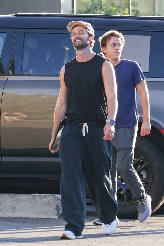 Patrick Schwarzenegger flaunted his toned arms while with John Owen Lowe in Los Angeles on Saturday.