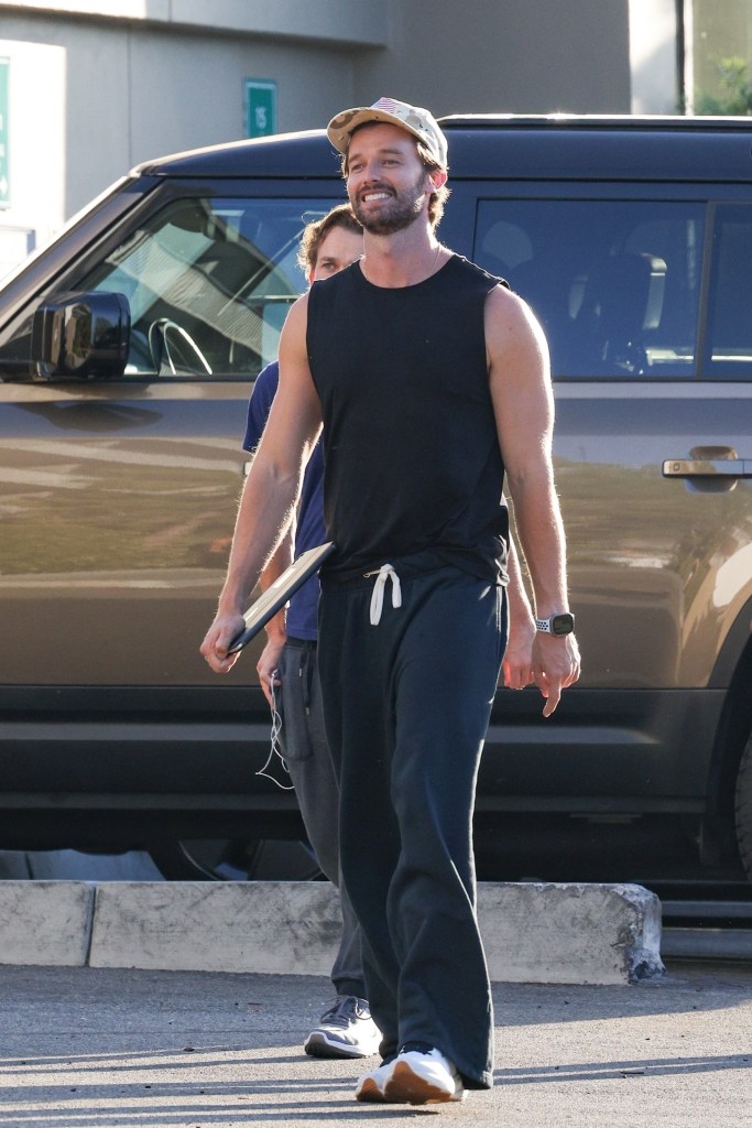 Patrick Schwarzenegger flaunted his toned arms while with John Owen Lowe in Los Angeles on Saturday.