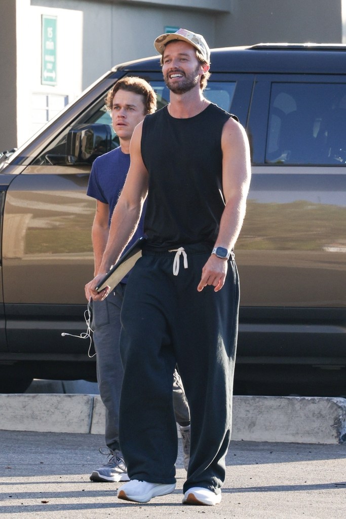 Patrick Schwarzenegger flaunted his toned arms while with John Owen Lowe in Los Angeles on Saturday.