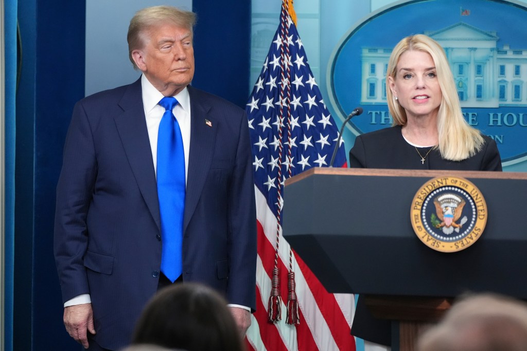 Donald Trump and Pam Bondi at a White House press briefing.