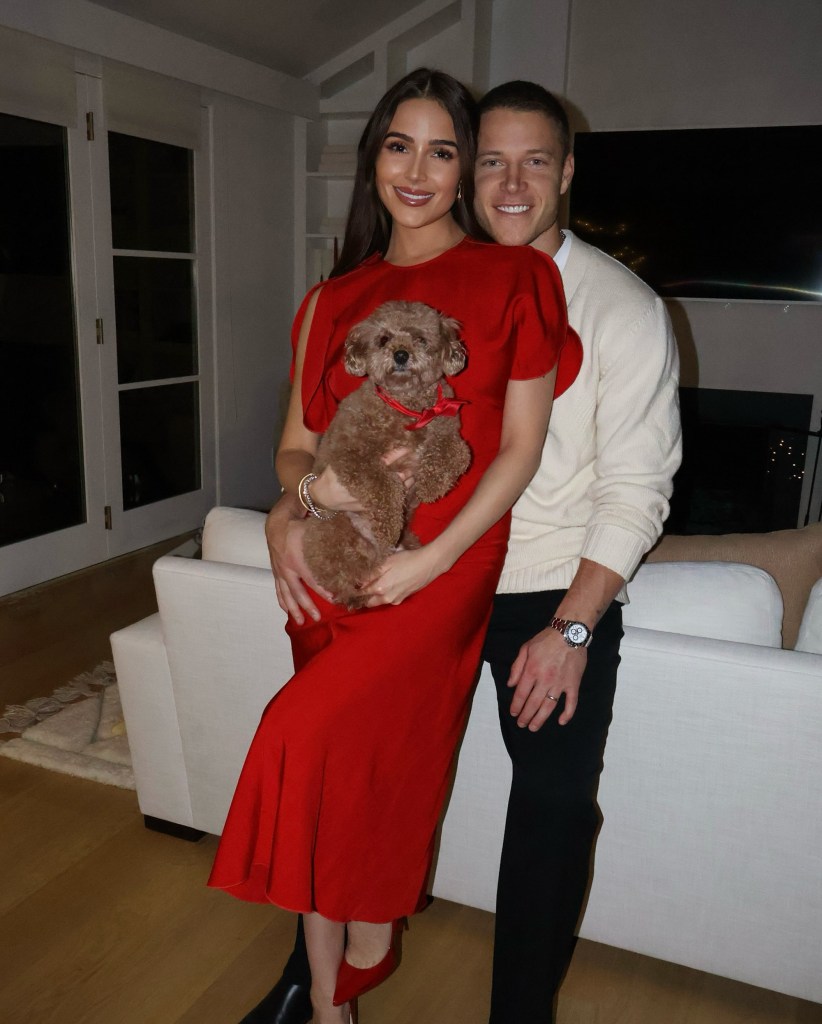 Olivia Culpo and Christian McCaffrey with their daughter