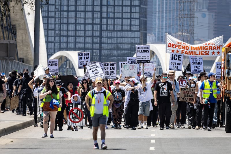 Los Angeles, CA - July 01: Several dozen protesters stage a demonstration on the Sixth Street Bridge between downtown Los Angeles and Boyle Heights protesting ICE deportation operations in LA on Tuesday, July 1, 2025 in Los Angeles, CA. (Jason Armond / Los Angeles Times via Getty Images)