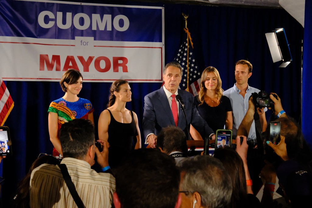 Andrew Cuomo with his daughters and son-in-law at his election night party.