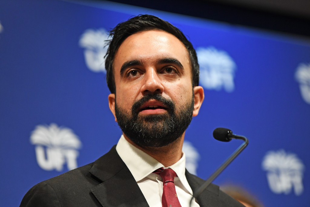 Photo of mayoral candidate Zohran Mamdani at a press conference.