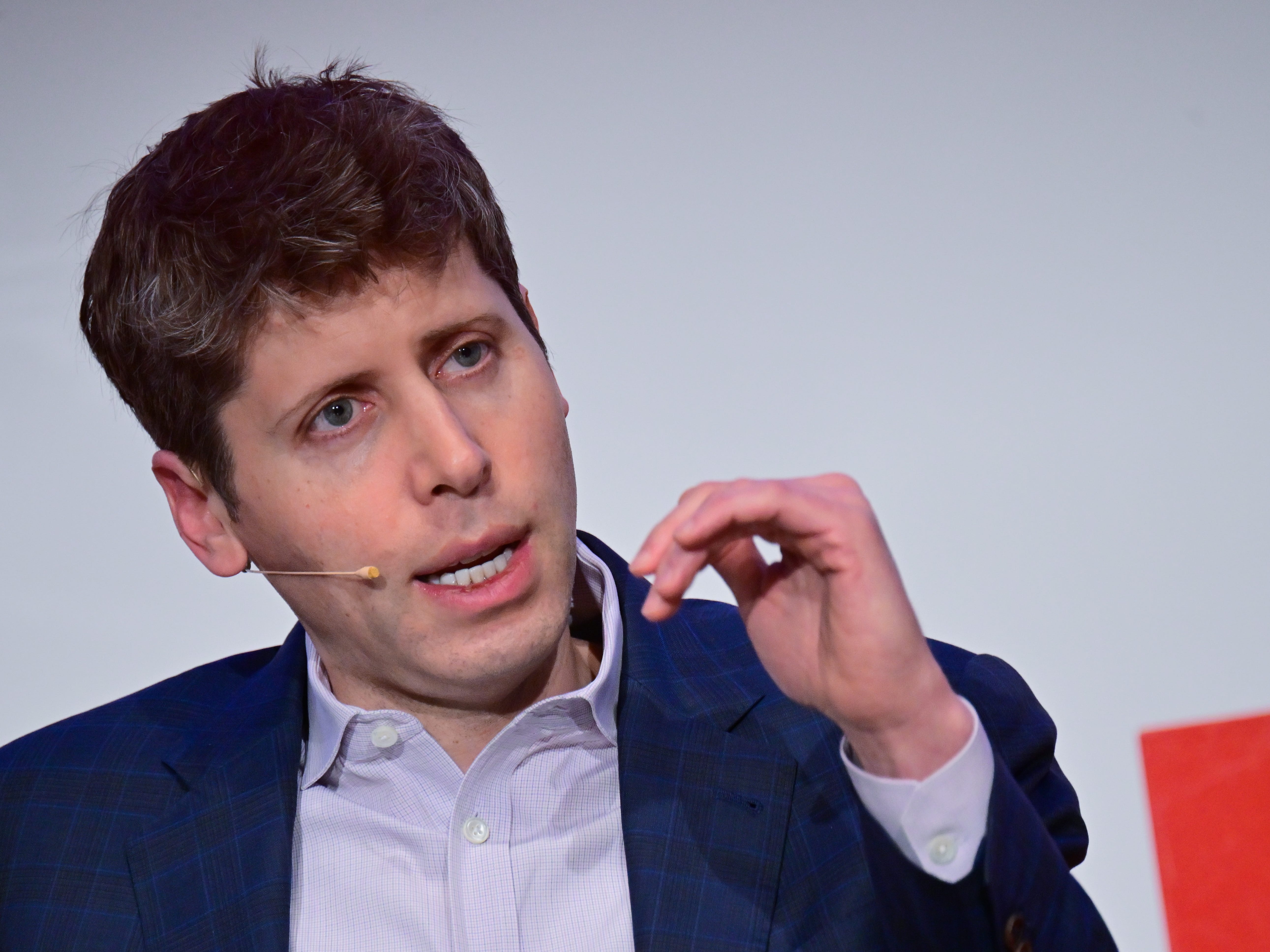 Sam Altman speaking at a panel discussion at TU Berlin.