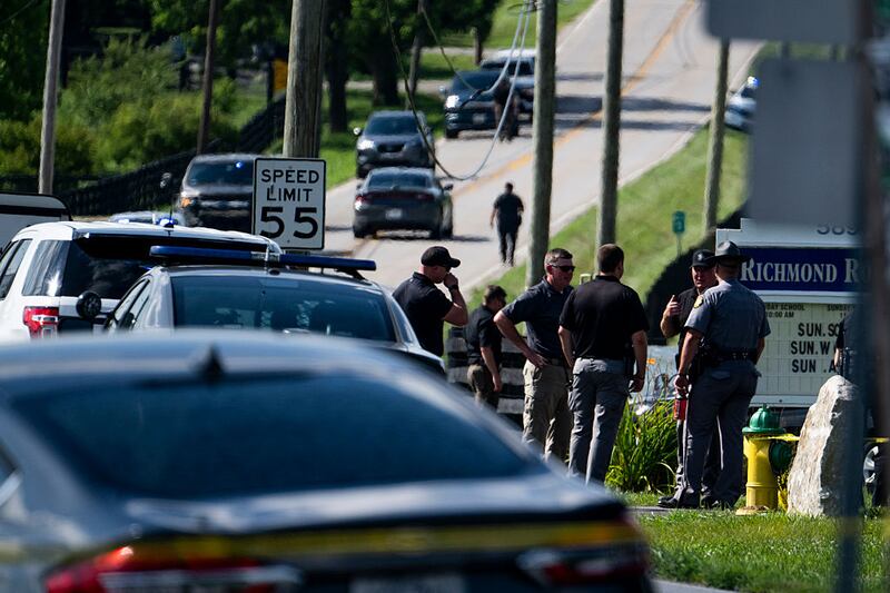 LEXINGTON, KENTUCKY - JULY 13: Police assess the scene after a shooting at Richmond Road Baptist Church on July 13, 2025 in Lexington, Kentucky. Two people were killed and two others injured at the church after the shooter shot and injured a state trooper at the Blue Grass Airport before fleeing and eventually stopping at the Richmond Road Baptist Church. (Photo by Michael Swensen/Getty Images)