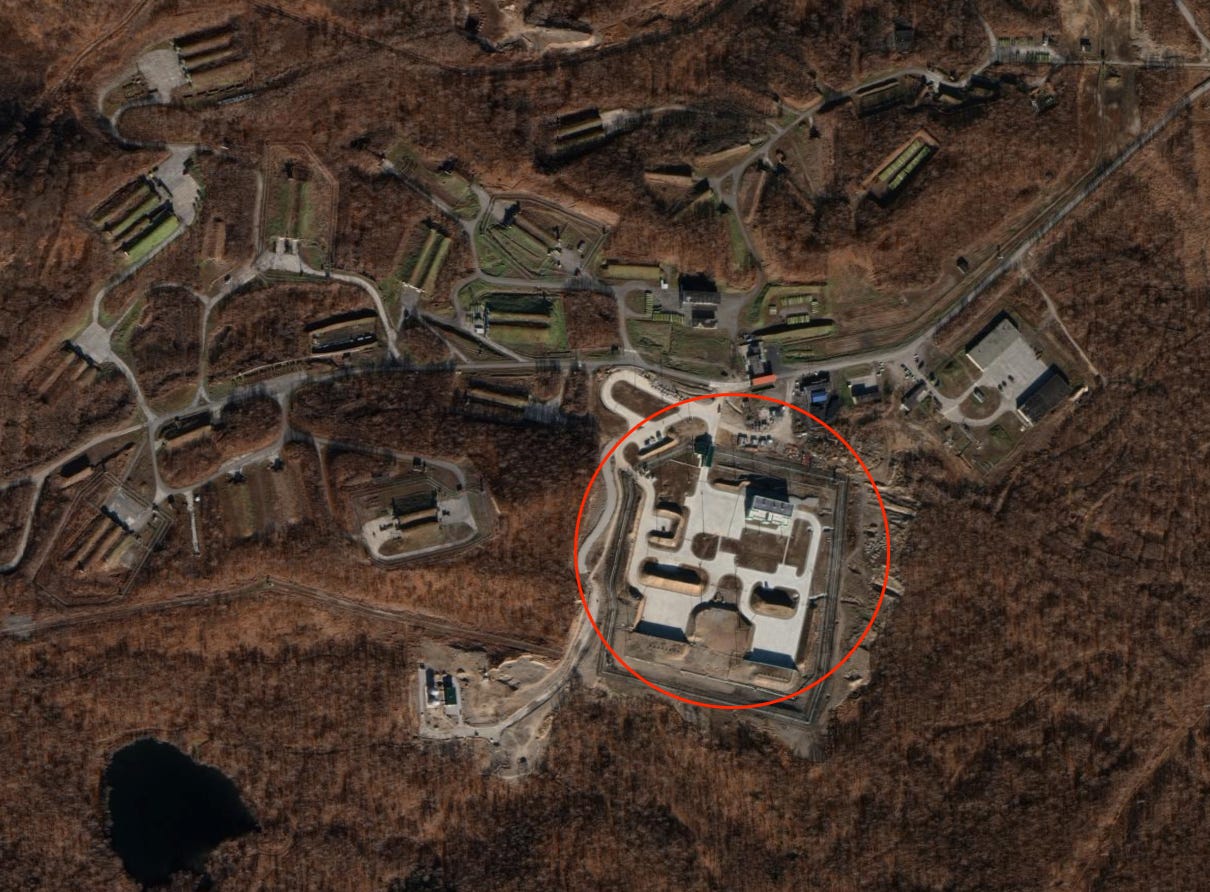 An annotation shows the location of a suspected nuclear storage bunker.
