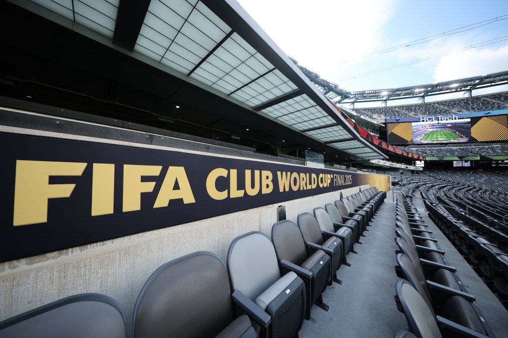 Empty seats in a stadium with a FIFA Club World Cup Final 2025 sign.