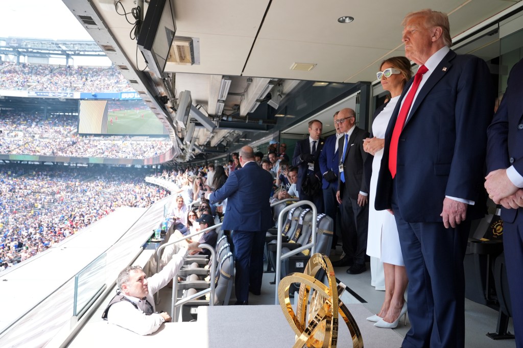 Donald and Melania Trump at a soccer match.