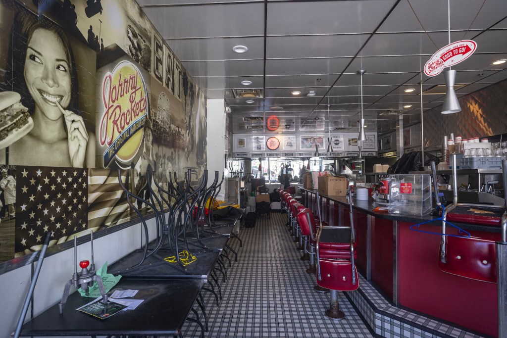 An empty Johnny Rockets restaurant on Santa Monica's Third Street Promenade that reportedly closed due to crime and vandalism. 