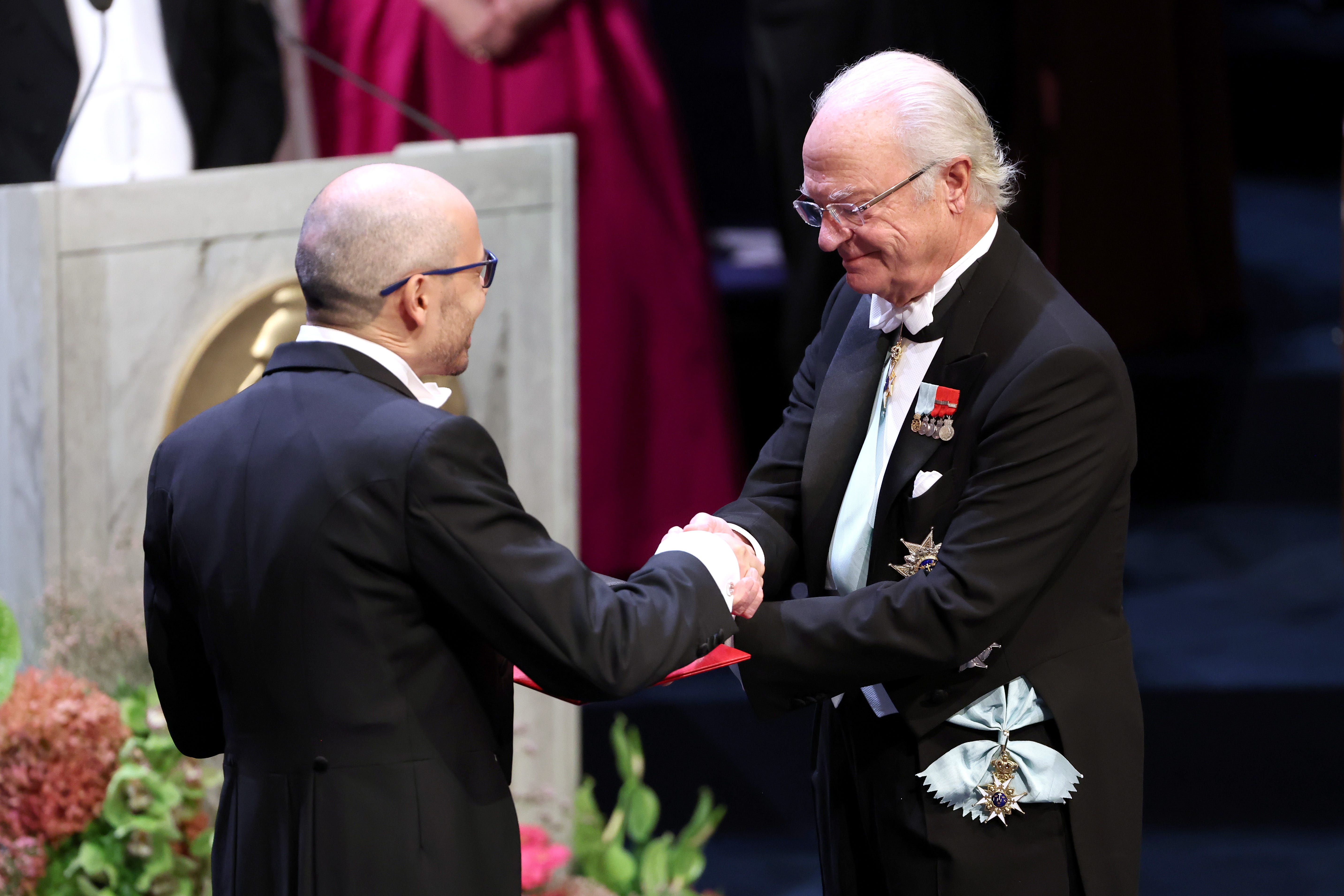 Hassabis receiving the Nobel Prize in Chemistry in 2024