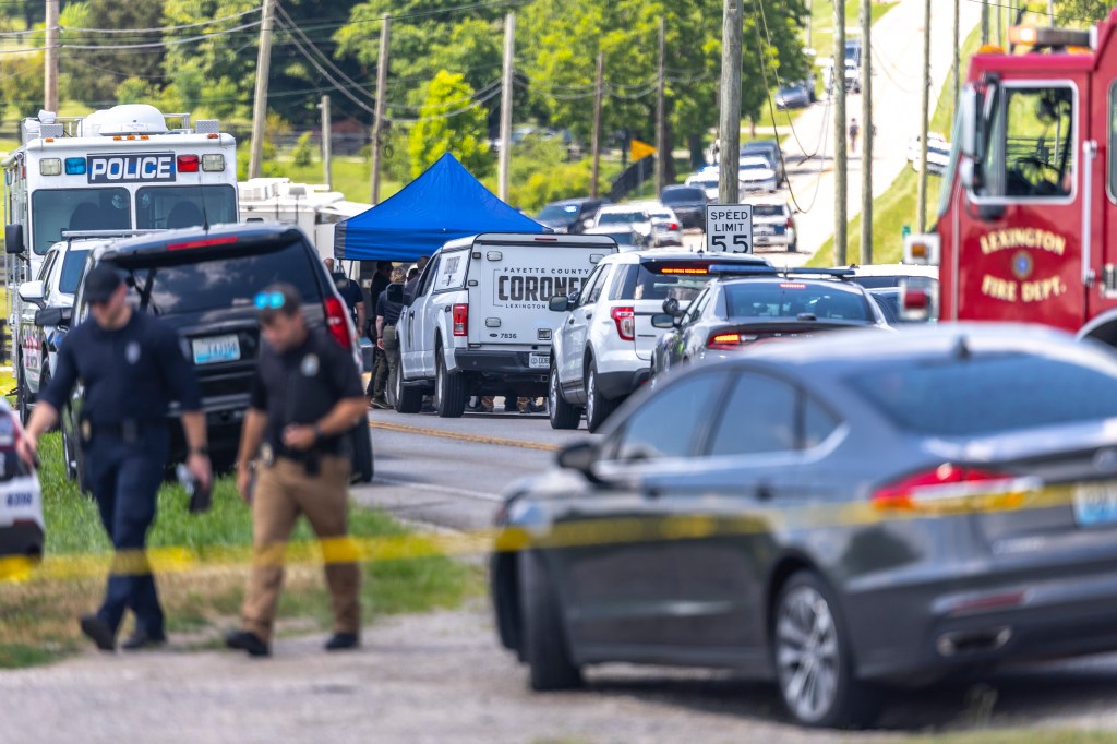 Law enforcement members respond to a shooting near Richmond Road Baptist Church in Lexington, Ky., Sunday, July 13, 2025.